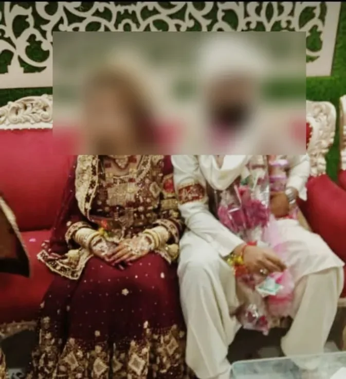 Traditional Nikkah stage setup with bride and groom receiving blessings