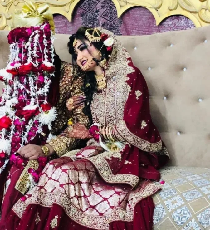 Traditional Barat ceremony featuring bride and groom in classic bridal wear
